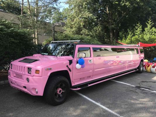Stretch one limo offers Hummer H2 Limousines - Pink Limo Rental in NJ and NY